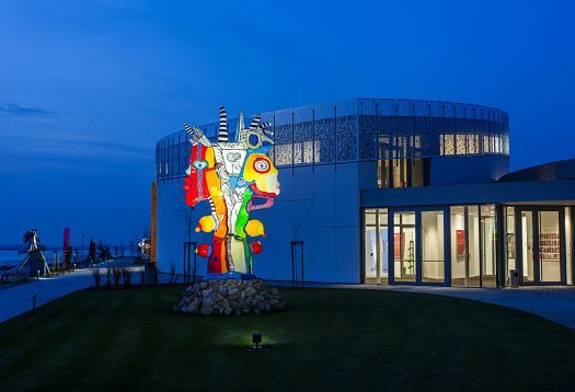 Illuminated sculpture at the Danubiana Museum, Bratislava, highlighted with ERCO lighting.