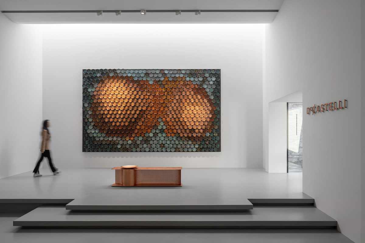 De Castelli showroom, Beijing: ERCO LED spotlights illuminate metal artworks and furniture, accentuating textures.