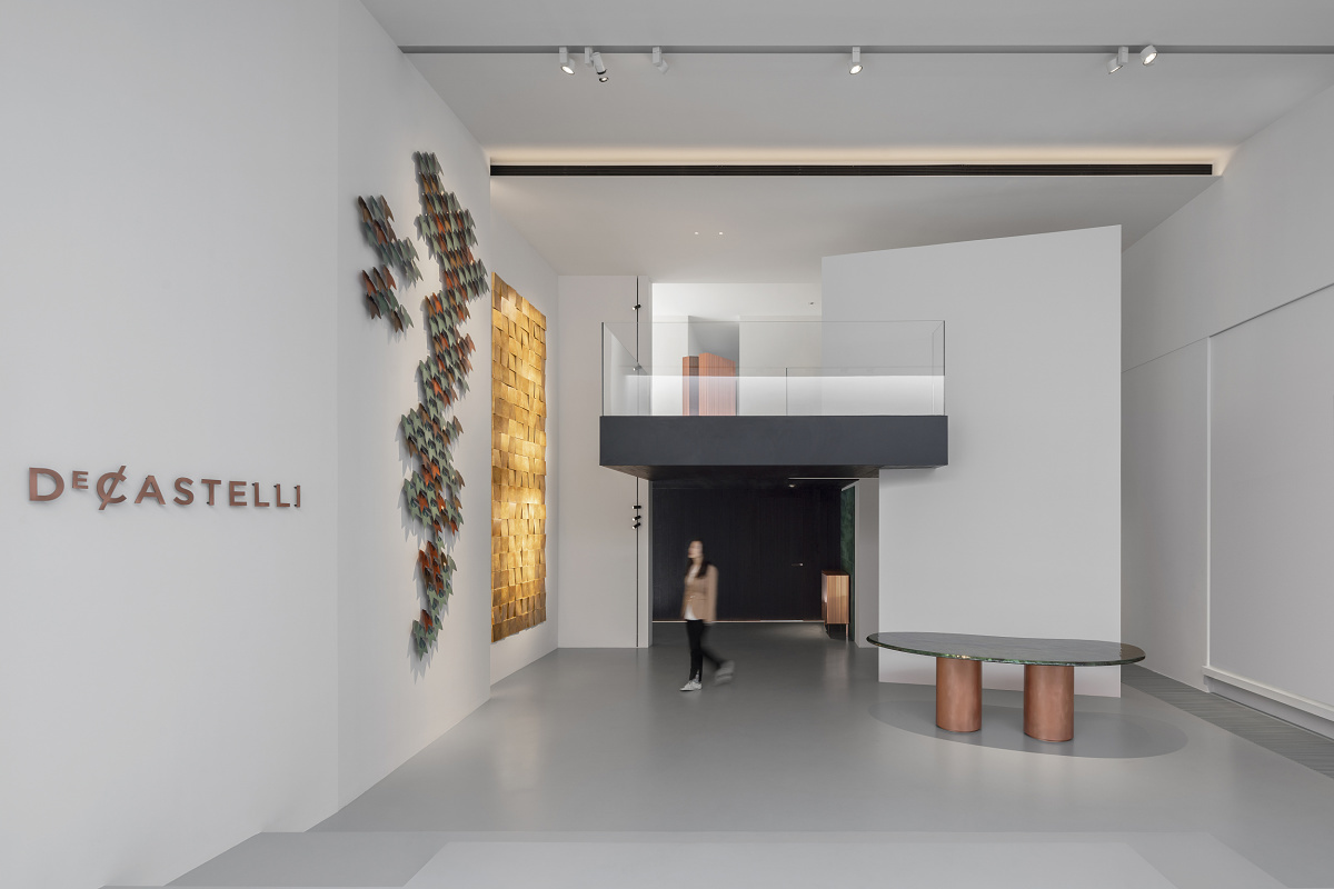 De Castelli showroom in Beijing, featuring ERCO LED lighting highlighting metal art and furniture.