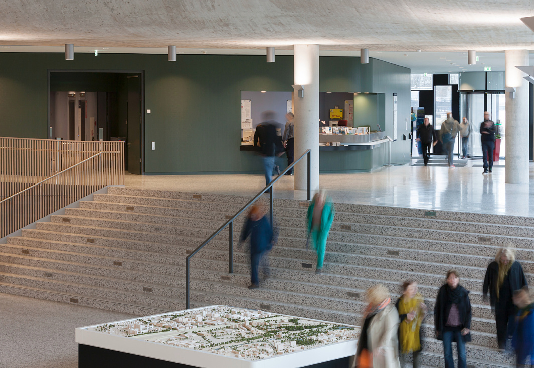 Interior of the Department of Urban Development and Environment in Hamburg, featuring ERCO lighting and a city model.