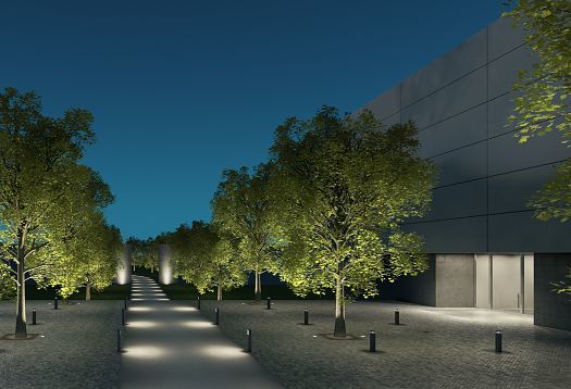ERCO outdoor lighting illuminates trees and pathways in a nighttime landscape.