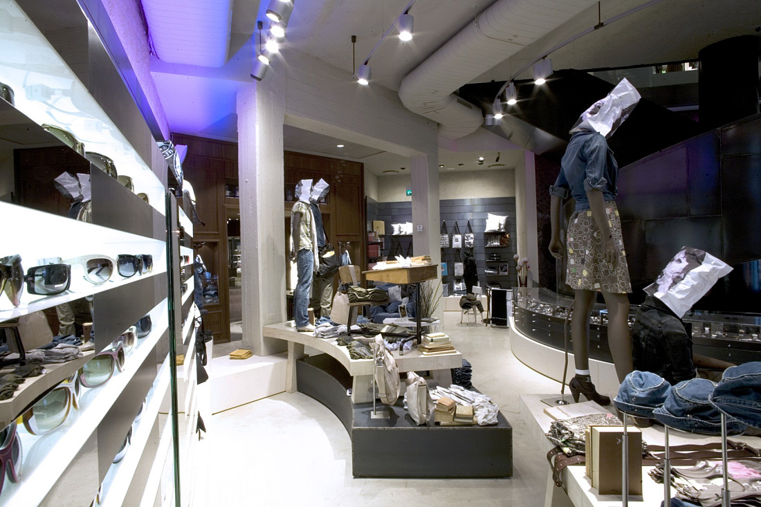 Diesel Flagship Store in Milan featuring ERCO lighting, Emanon LED spotlights with seasonal color accents.
