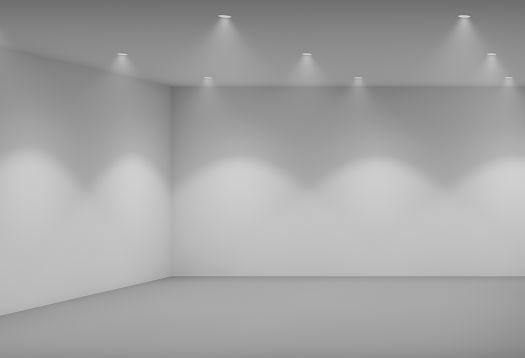 ERCO directional spotlights in a room, creating focused light for accent lighting.