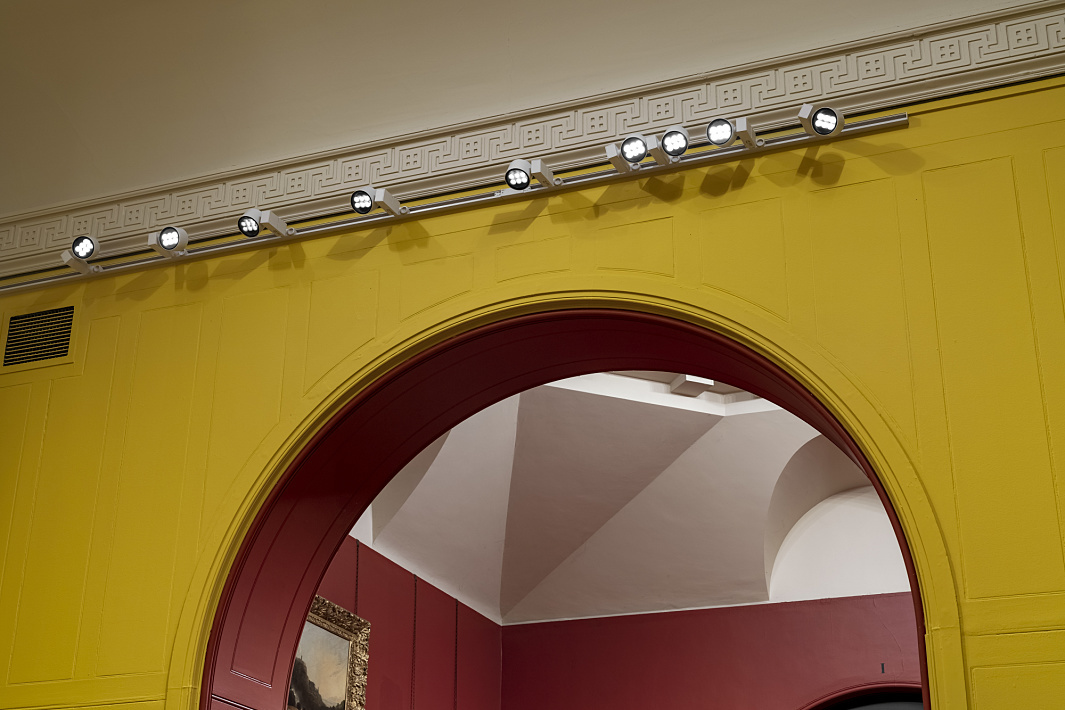 ERCO Optec LED spotlights on a track in Dulwich Picture Gallery, illuminating the Rembrandt exhibition.