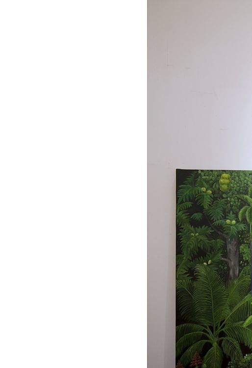 Man stands before art at Durbar Hall, Kochi Biennale, illuminated by ERCO Logotec LED spotlights.