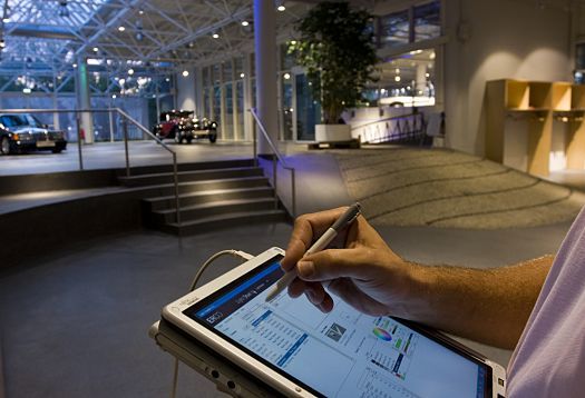 ERCO lighting design on a tablet for efficient visual comfort in public buildings.