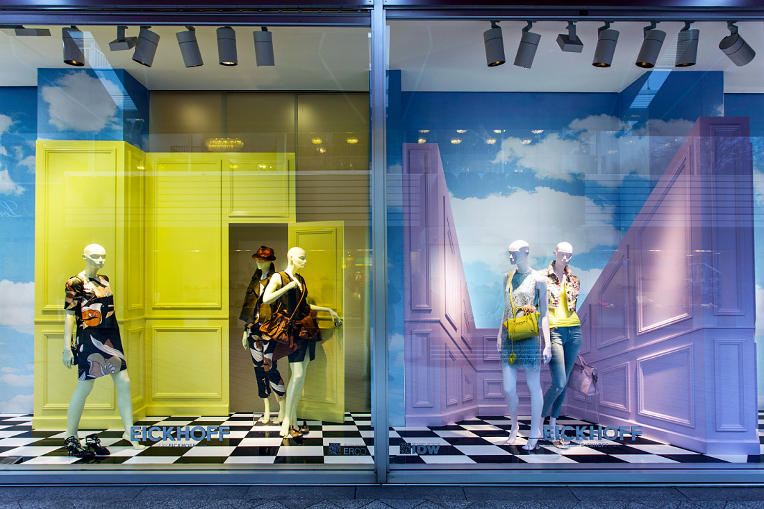 Eickhoff fashion store window display in Düsseldorf, featuring surreal design and ERCO LED lighting.