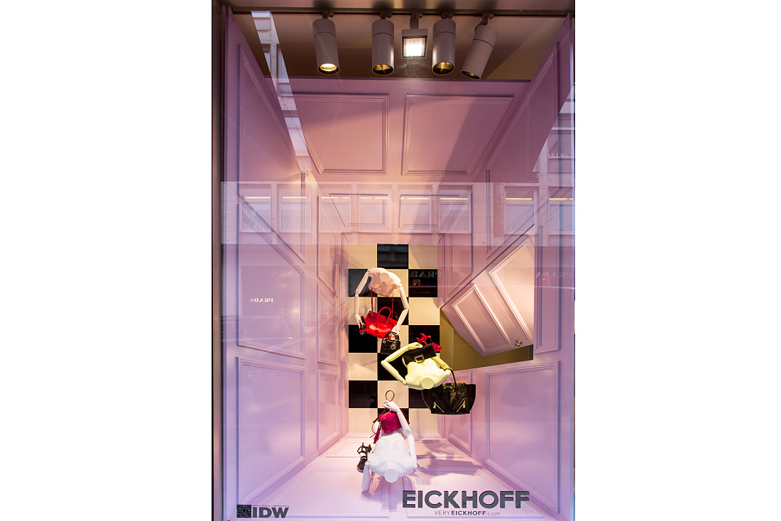 Eickhoff fashion store window display in Düsseldorf, featuring surreal design and ERCO LED lighting.