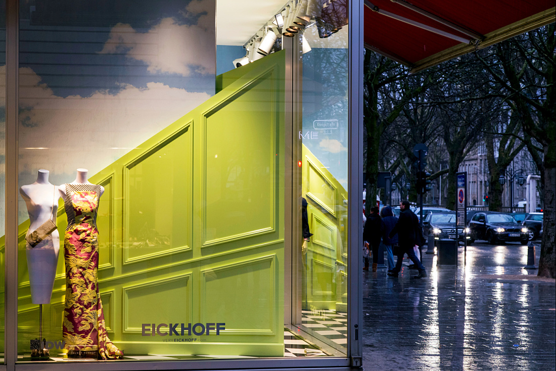 Eickhoff fashion boutique in Düsseldorf featuring a surreal window display with ERCO LED lighting.