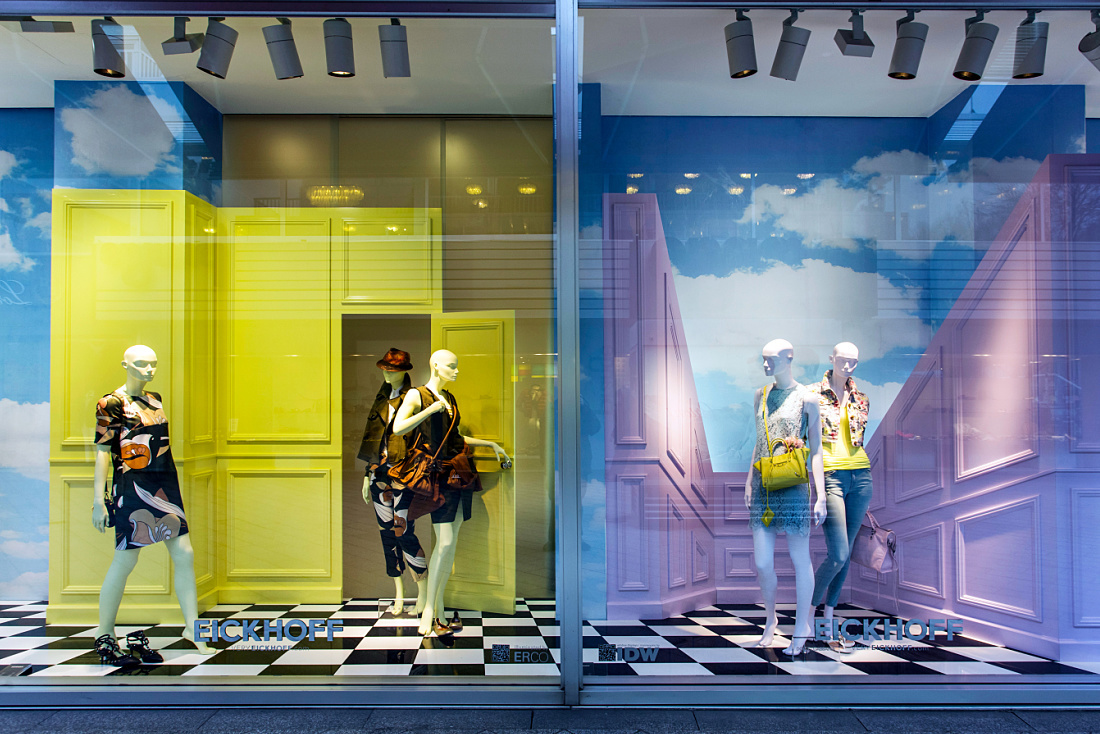 Eickhoff fashion store window display in Dusseldorf, featuring surreal design and ERCO LED lighting.