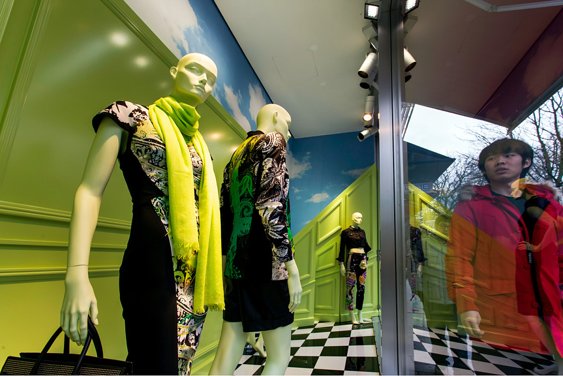 Eickhoff fashion store window display in Dusseldorf, featuring LED lighting and surreal design.