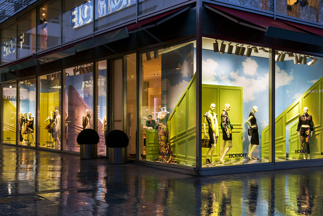 Eickhoff fashion store window display in Dusseldorf, featuring LED lighting and surrealist design.