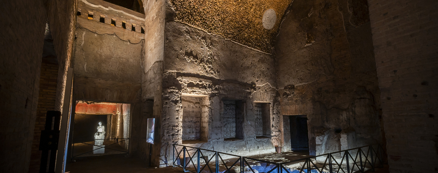 Illuminated interior of Domus Aurea in Rome, featuring ERCO lighting solutions.
