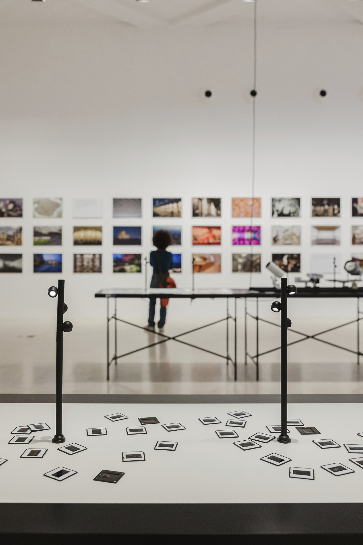 ERCO Light Box exhibit in Milan featuring LED lighting and photography.