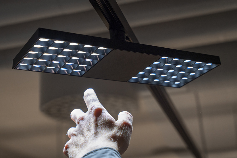 ERCO Jilly downlight for track in a modern office, showcasing flexible office lighting.