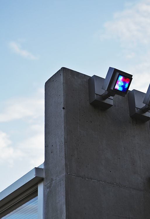 ERCO LED lighting at the concrete conference center, showcasing creative illumination.
