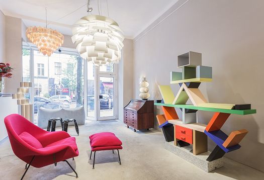 Firma London store featuring vintage design furniture illuminated by flexible ERCO LED lighting.