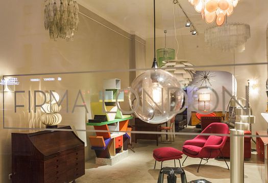 Firma London store featuring vintage design furniture illuminated by ERCO LED lighting with Spherolit technology.