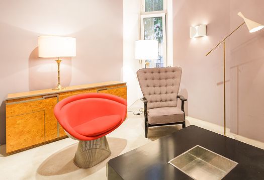 Vintage furniture at Firma London, illuminated by flexible ERCO LED spotlights.