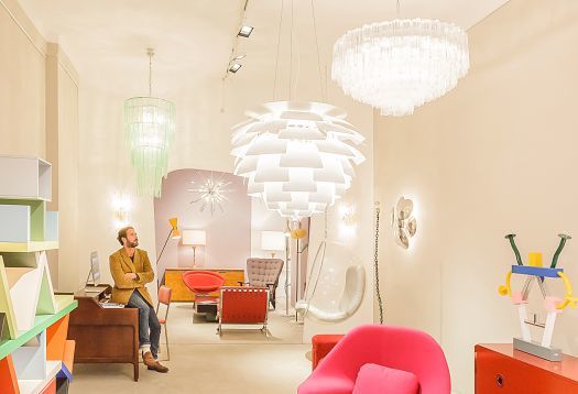 Firma London store featuring vintage furniture illuminated by ERCO LED lighting with Spherolit technology.
