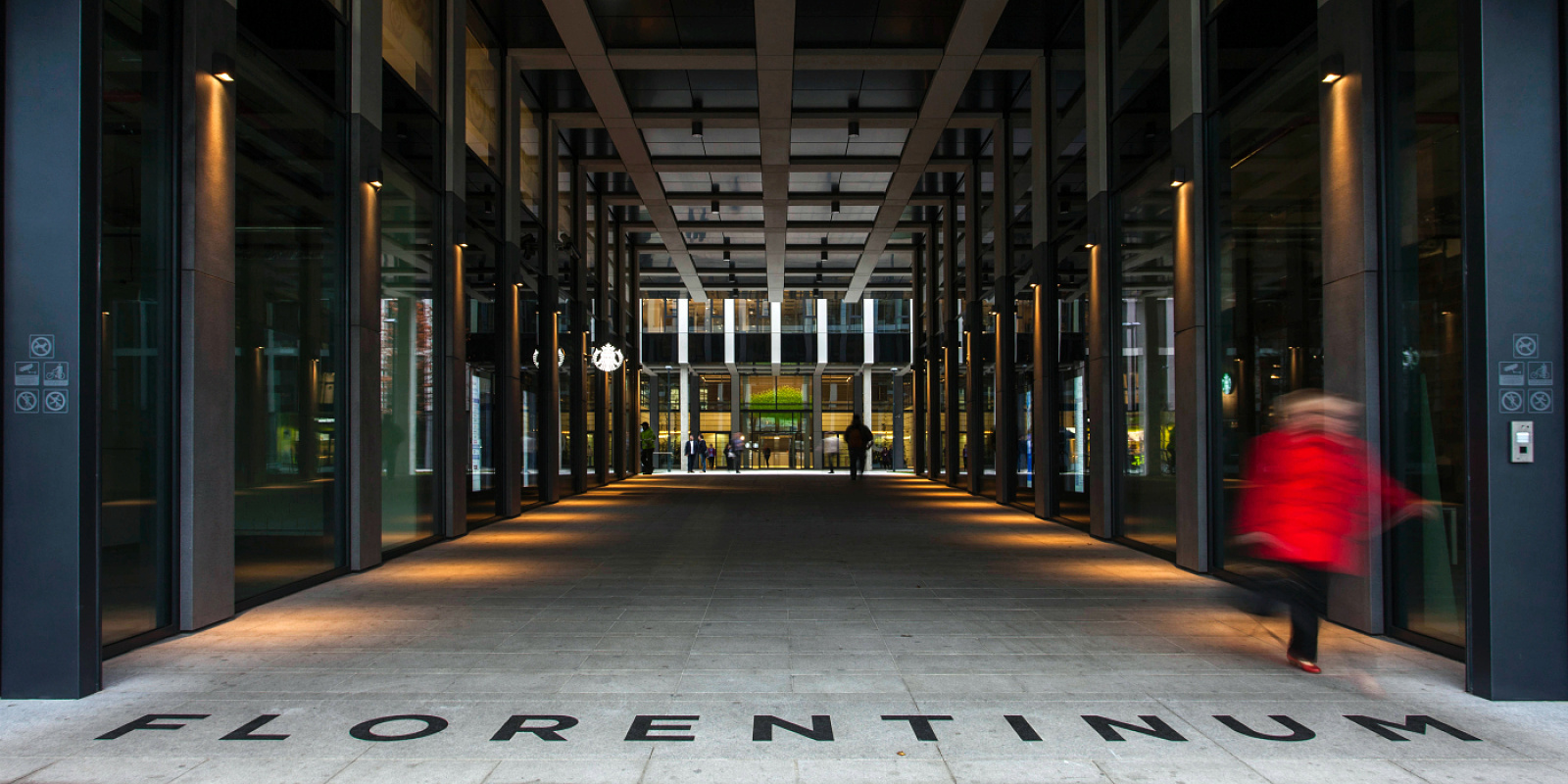Florentinum office building in Prague illuminated by ERCO outdoor luminaires for orientation and amenity.