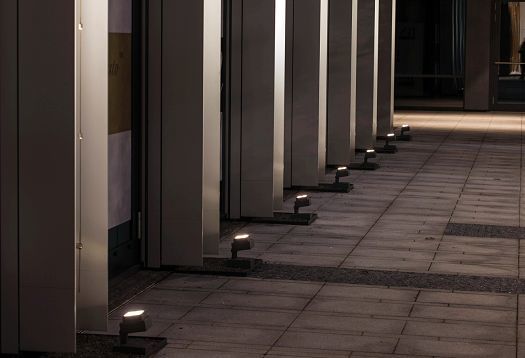 ERCO Kubus bollard luminaires illuminate the path at the Florentinum office building in Prague.