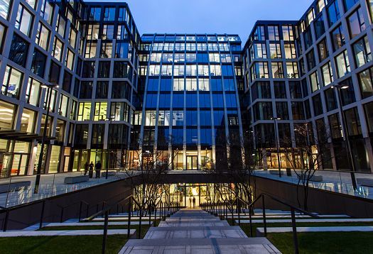 Florentinum office building in Prague, featuring ERCO outdoor lighting for orientation and high amenity value.