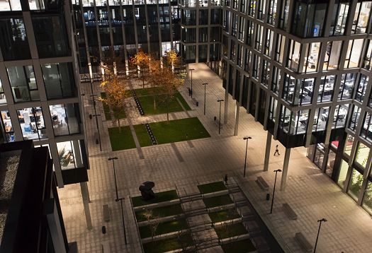 Florentinum office building in Prague with ERCO outdoor lighting for orientation and amenity.