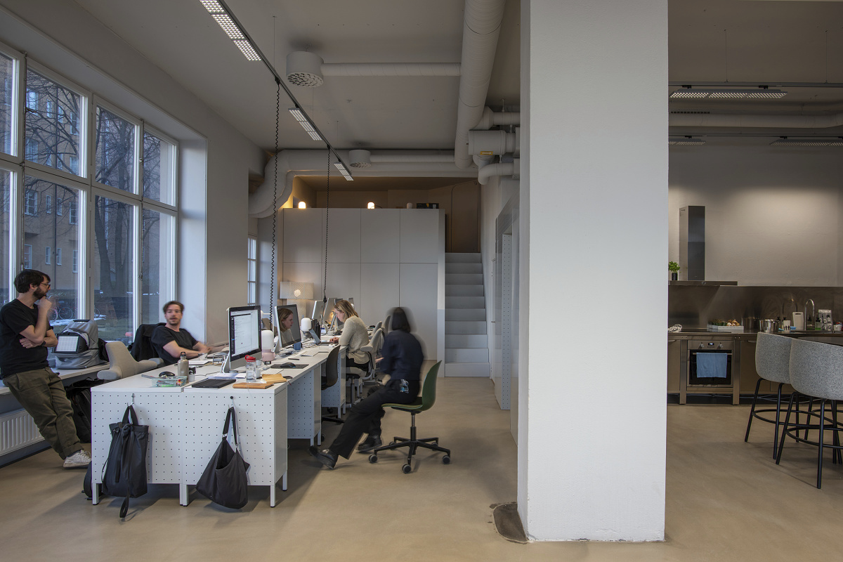 Form Us With Love studio illuminated by flexible ERCO Jilly downlights for modern office lighting.