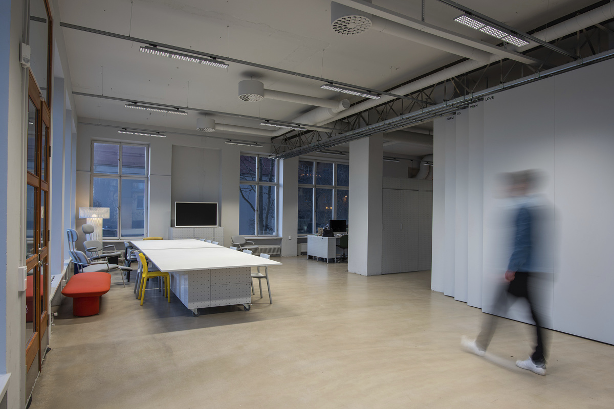 ERCO Jilly downlights in a Form Us With Love office, providing flexible office lighting.