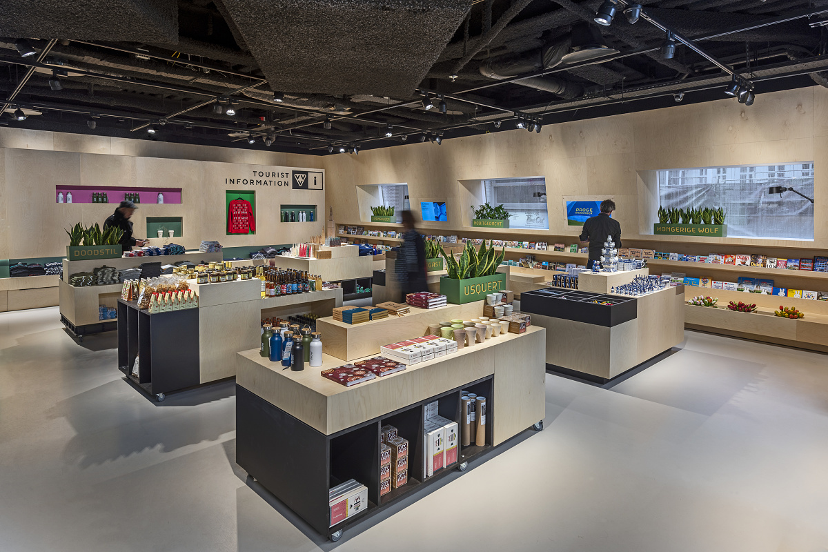 Interior of Forum Groningen featuring LED lighting and retail displays.