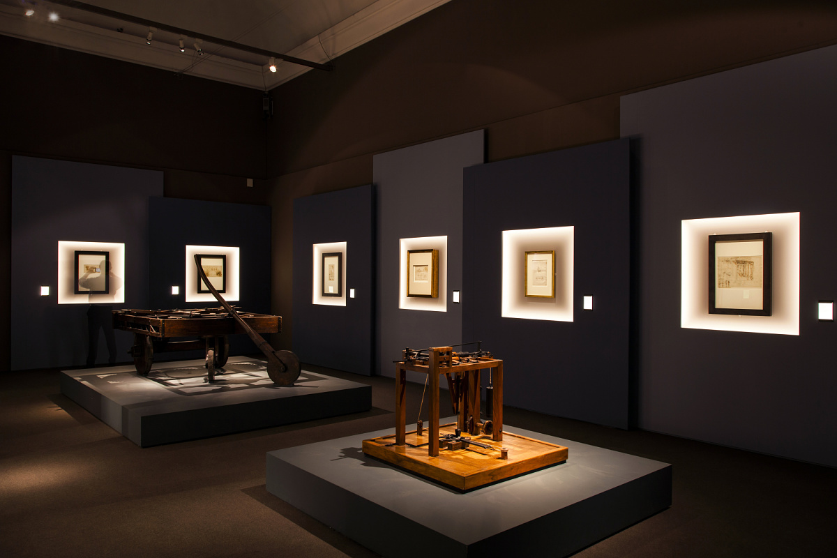Museum exhibit featuring artworks illuminated by ERCO contour spotlights for precise framing.