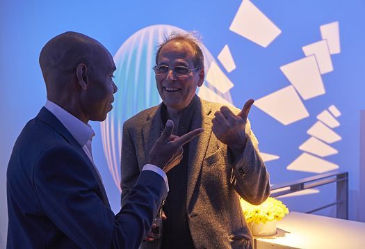 Discussion about Frank Lloyd Wright at the ERCO London showroom, illuminated by ERCO LED lighting.