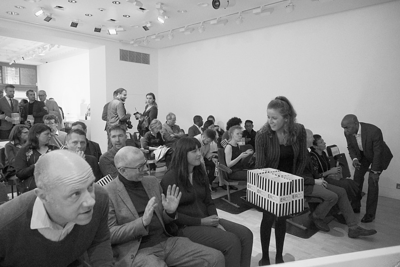 ERCO showroom in London screening 'Frank Lloyd Wright' film, lit by ERCO lighting.