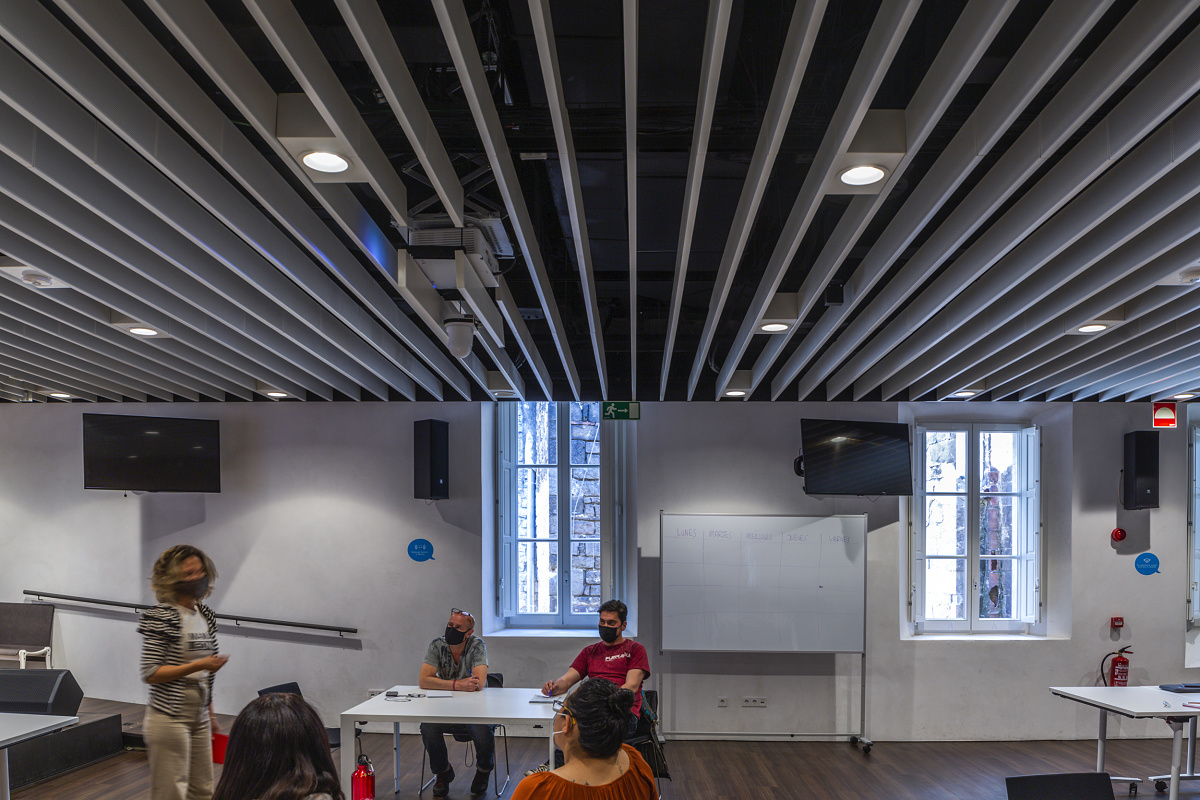 ERCO Skim recessed downlights providing workplace lighting at Fundació Esperança, Barcelona.