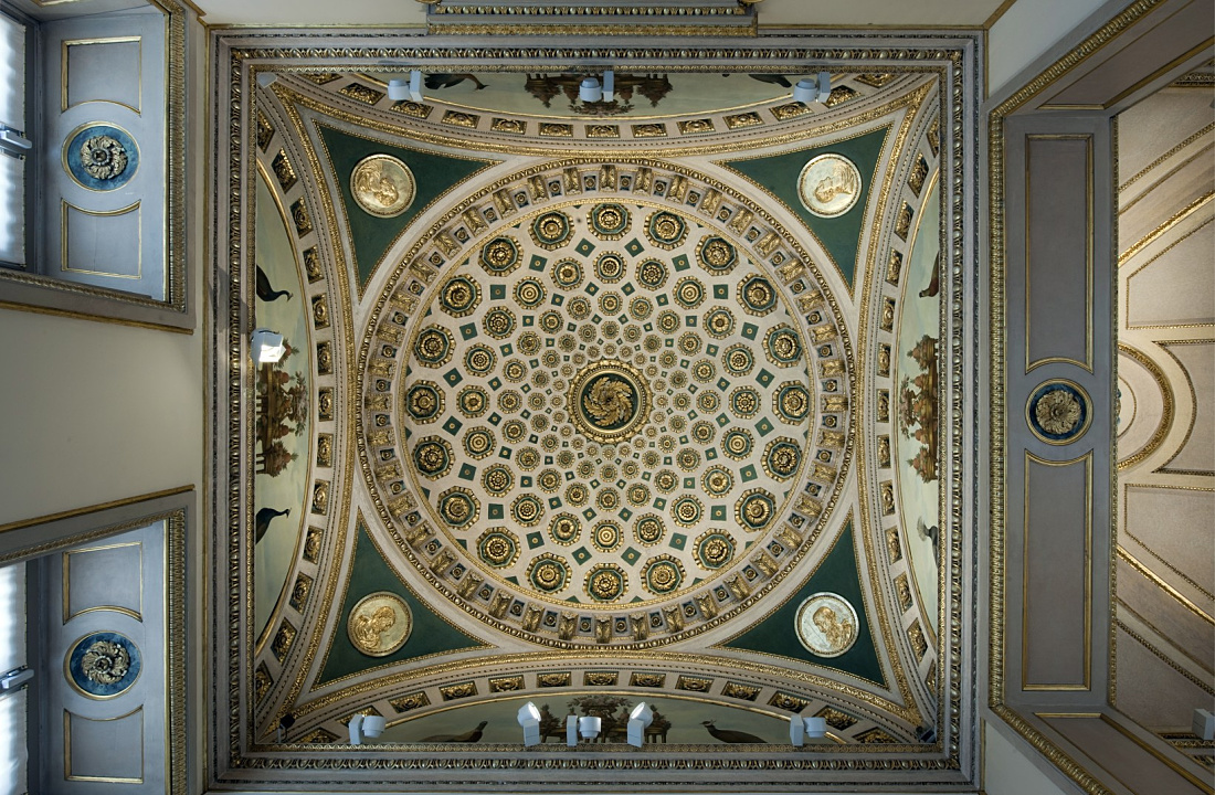 Ornate ceiling detail at Gallerie d’Italia, illuminated by ERCO LED spotlights.