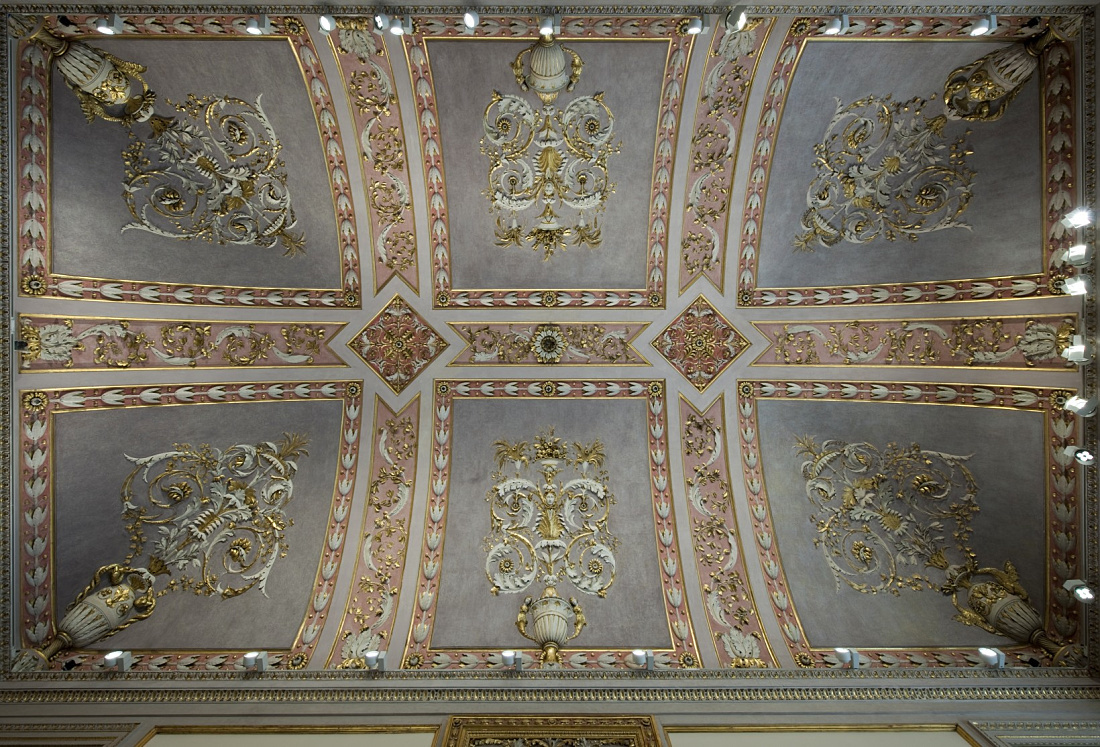 Ornate ceiling detail at Gallerie d’Italia, illuminated by ERCO LED spotlights.
