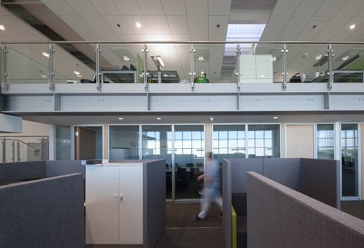 ERCO LED downlights in a modern Gebr. Heinemann office, Hamburg, providing efficient lighting and high visual comfort.