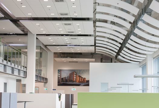 ERCO LED downlights in a modern Gebrüder Heinemann office, providing efficient lighting for high visual comfort.