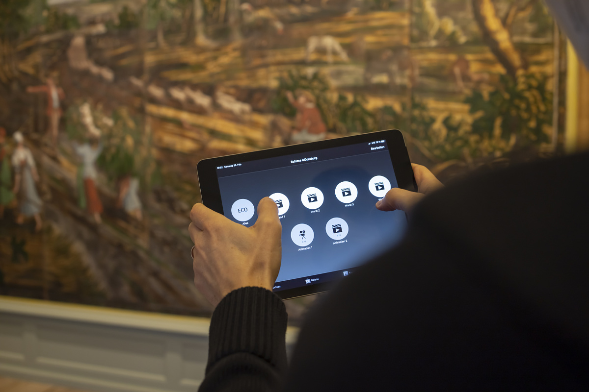 Tablet controlling Eclipse spotlights in Glücksburg Castle, wirelessly networked via Casambi.