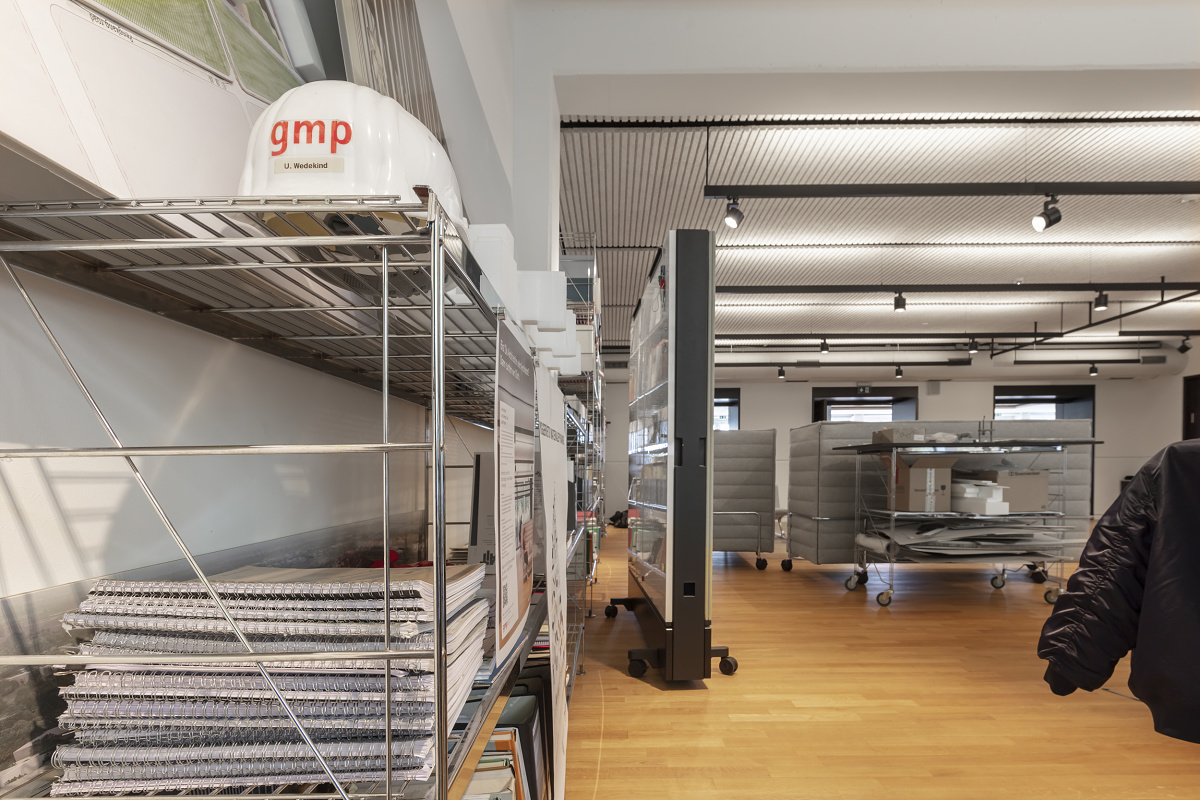 gmp Architekten office in Hamburg, featuring ERCO lighting and shelving systems.