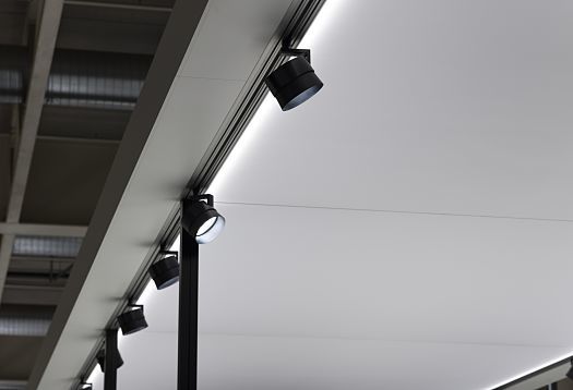 ERCO Parscan spotlights on a track, used at Grand Basel to illuminate exhibits with focused light.