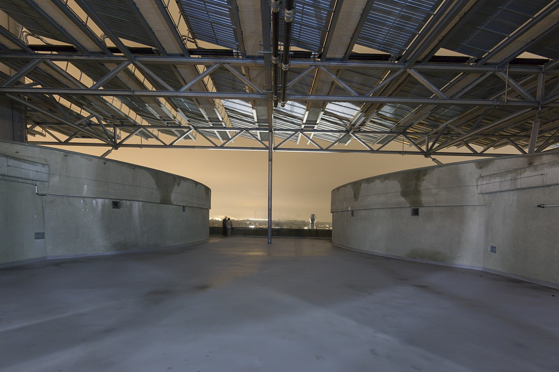 Energy Bunker Hamburg rooftop with ERCO lighting, a landmark for green energy and urban renewal.