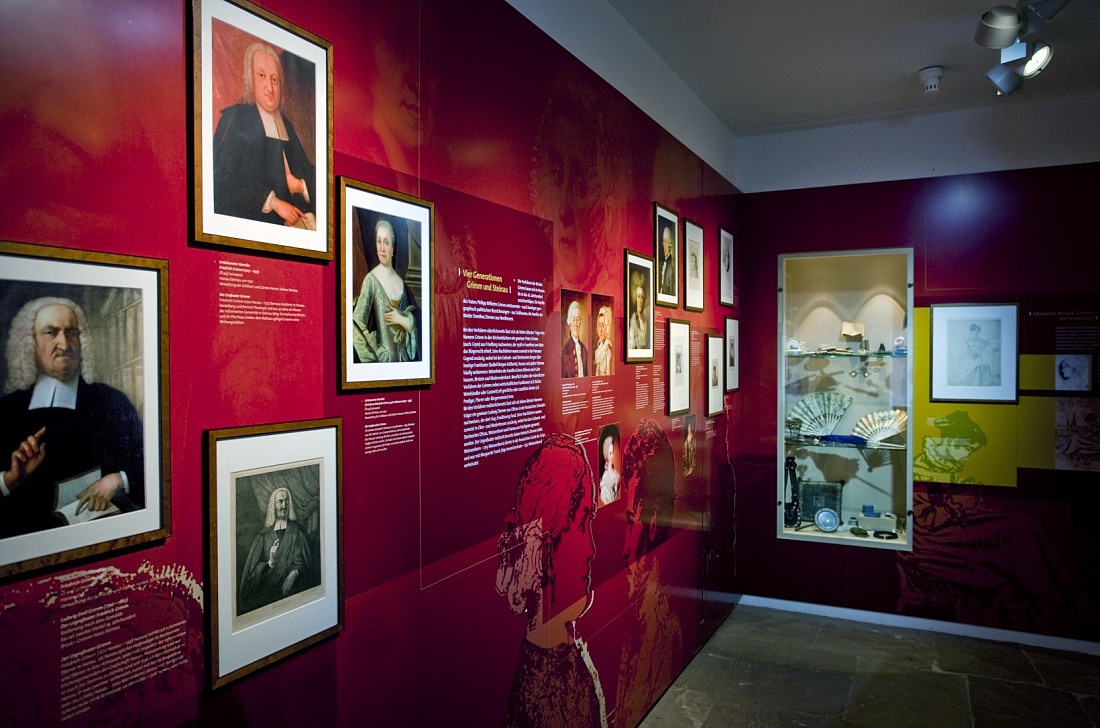Grimm Brothers House Museum exhibit featuring Optec LED spotlights for color contrast and exhibit protection.