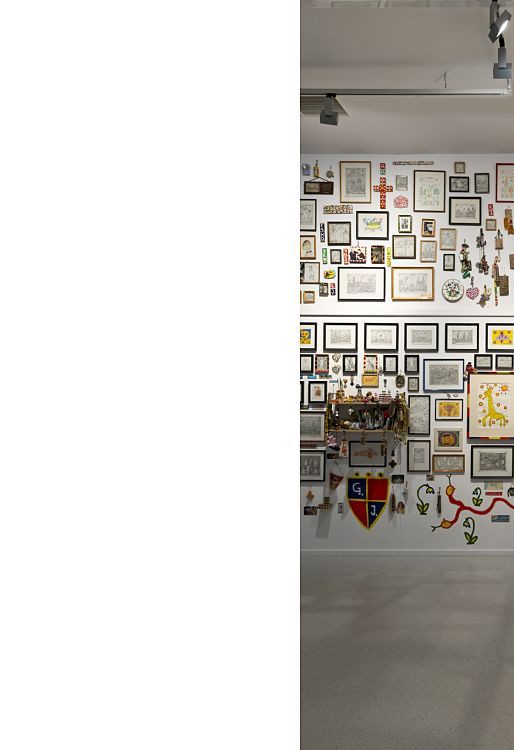 Gugging Museum wall installation featuring art brut, illuminated by ERCO Logotec spotlights for high contrast.