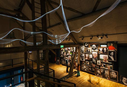 Gymnicher Mühle Museum: ERCO LED lighting highlights the historic watermill and river exhibition.