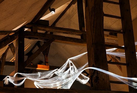 ERCO lighting design at KM 51 – Erftmuseum: Light installation of the river exhibit in a historic watermill.