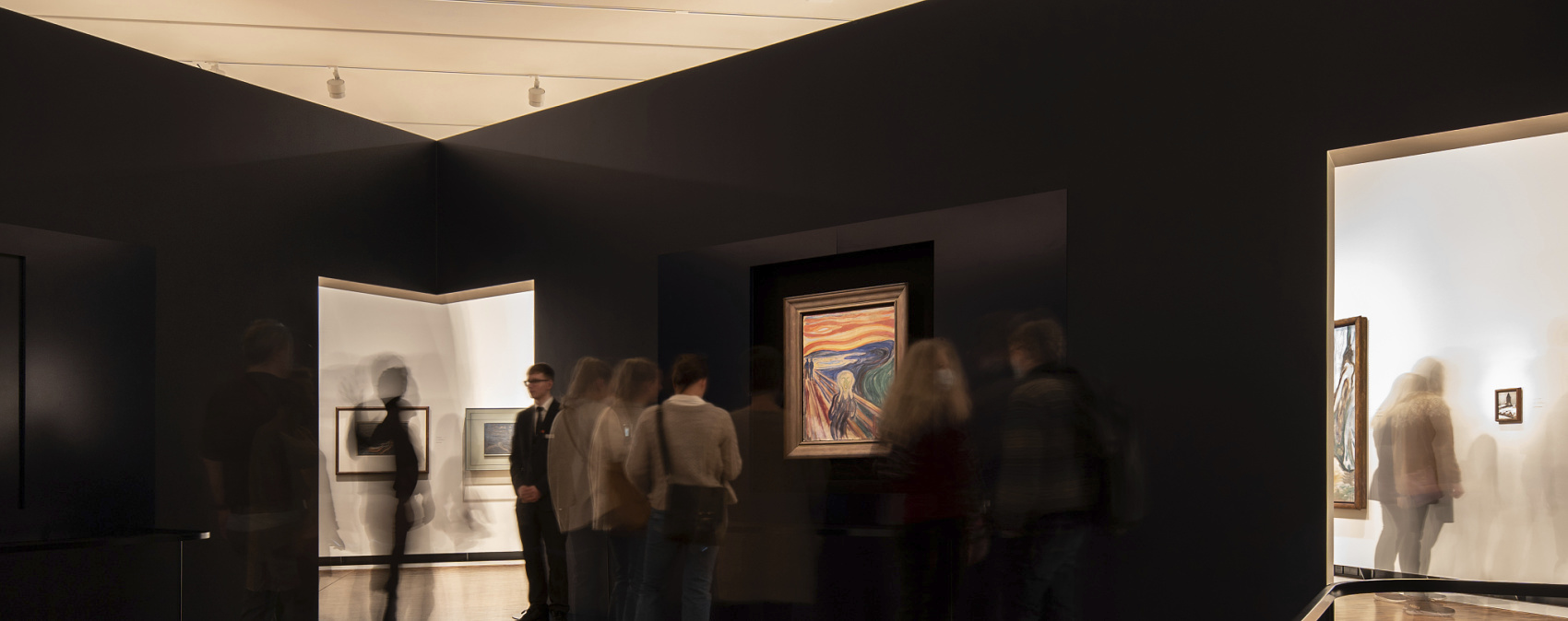 Visitors viewing Munch's 'The Scream' in the Munch Museum, lit by ERCO spotlights.
