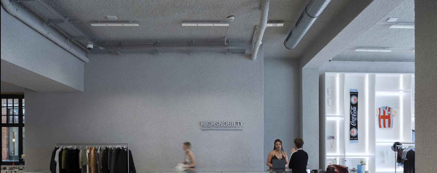 Highsnobiety Berlin store featuring Jilly LED downlights for flexible shop lighting.