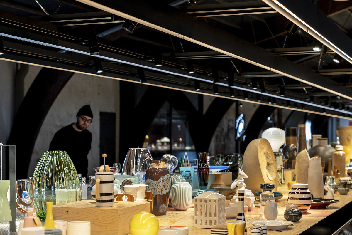 Holmegaard Værk Museum: Glass art on display, illuminated by ERCO LED spotlights.